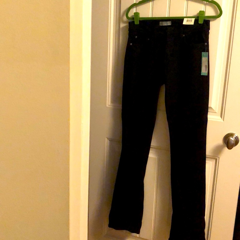 New Principle black jeans. Mid rise boot cut. Never worn/ tags on. Size 29